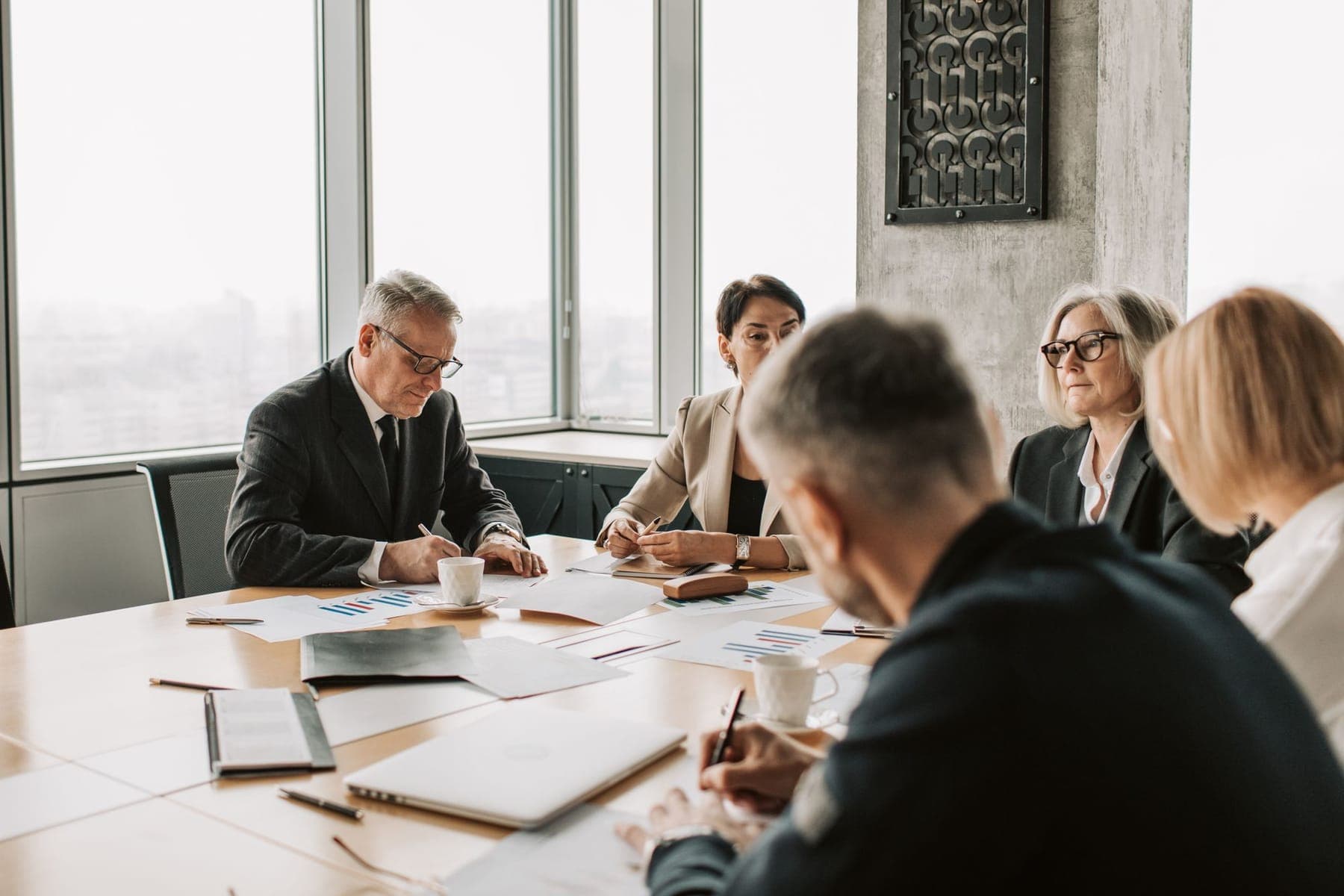 Business leaders in a boardroom meeting